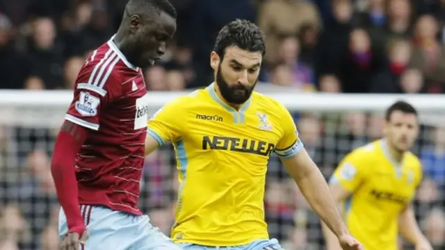 Mile Jedinak (right) in action against West Ham