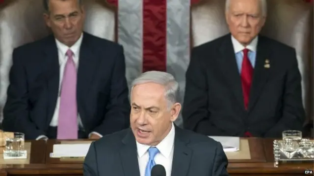 Prime Minister of Israel Benjamin Netanyahu (C) delivers a speech to a joint meeting of Congress on the floor of the US House of Representatives, in front of US House Speaker Republican John Boehner (L) and Republican Senator from Utah Orrin Hatch (R) in the US Capitol in Washington, DC 3 March 2015