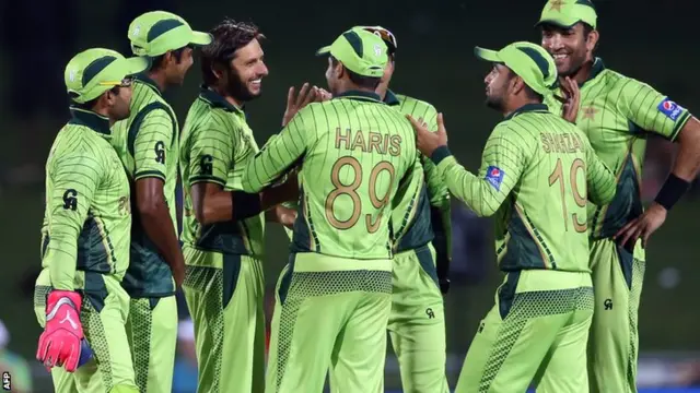 Pakistan celebrate a wicket with Shahid Afridi