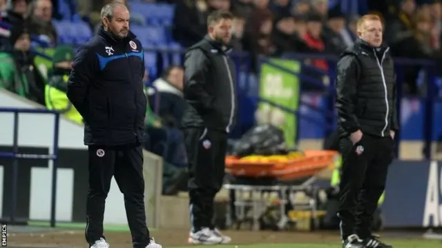 Neil Lennon (right) and Reading manager Steve Clarke watch the action