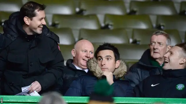 Dundee United manager Jackie McNamara and Celtic midfielder Kris Commons share a joke