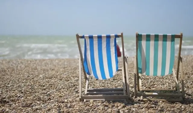 Deckchairs on beach