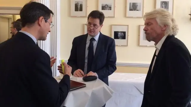 Nick Clegg (centre) ahead of a discussion on drugs policy