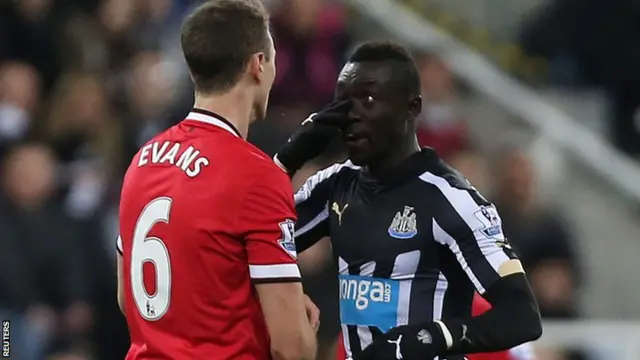 Papiss Cisse and Jonny Evans