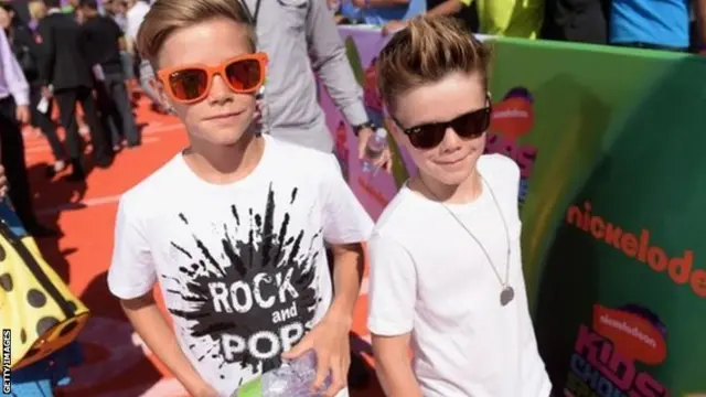 Romeo Beckham (left)