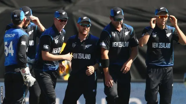 Brendon McCullum (centre) with New Zealand team-mates