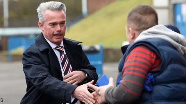 Interim chairman Paul Murray meets a Rangers fan