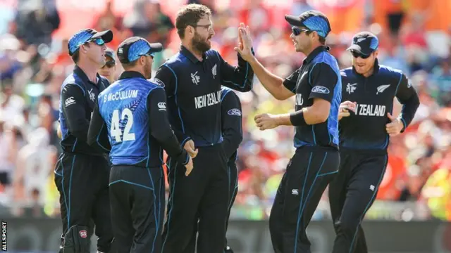 Daniel Vettori and Tim Southee, centre two
