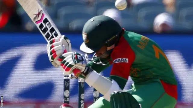 Mushfiqur ducks a Broad bouncer