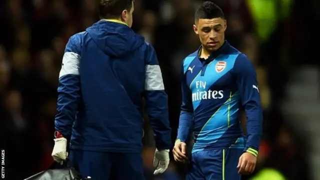 Alex Oxlade-Chamberlain leaves the field injured