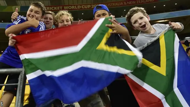 Supporters cheer as South Africa claim another wicket