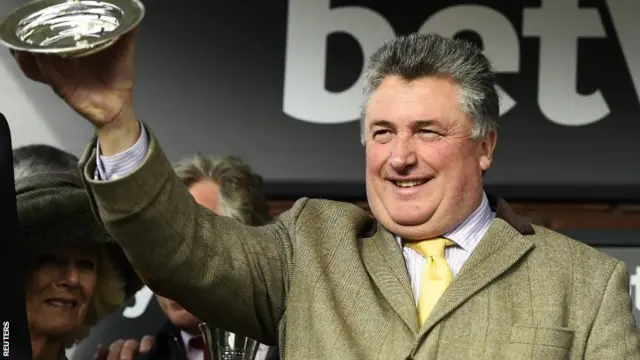 Paul Nicholls celebrates