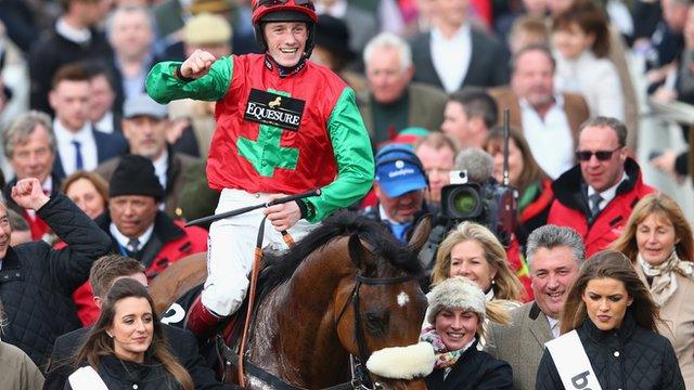 Sam Twiston-Davies celebrates winning the Queen Mother Champion Chase at Cheltenham on Dodging Bullets