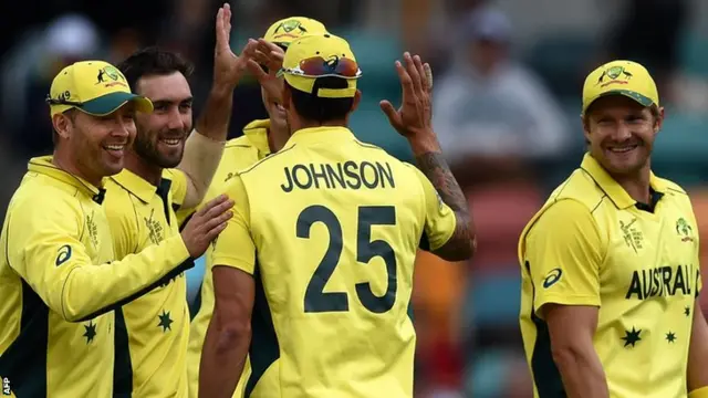 Glenn Maxwell, second left, celebrates