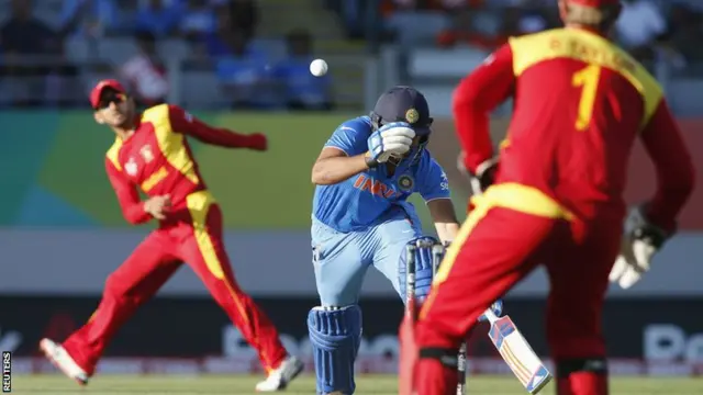 Rohit Sharma runs for the crease