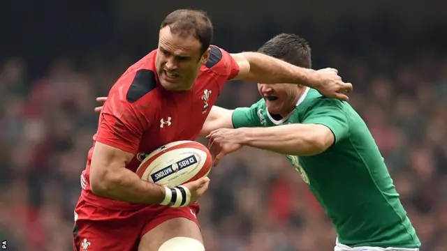 Wales centre Jamie Roberts blasts past Ireland 10 Johnny Sexton