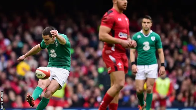 Johnny Sexton kicks over for Ireland