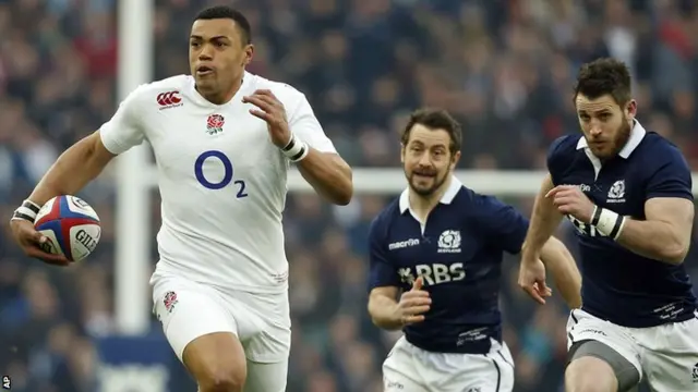 Luther Burrell breaks the Scottish defence