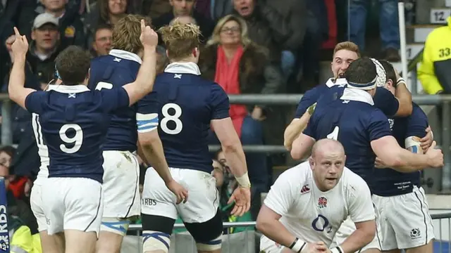 Mark Bennett celebrates his try