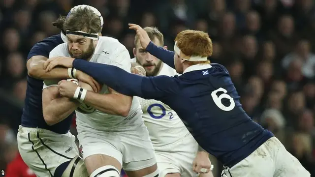 Geoff Parling tests the Scotland defence