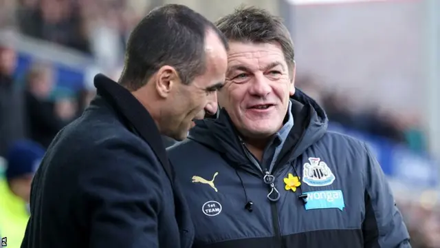 Everton manager Roberto Martinez (left) and Newcastle boss John Carver