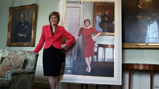 Nicola Sturgeon alongside a portrait of herself