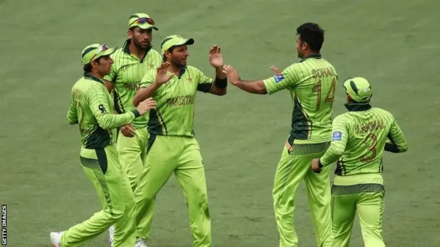 Pakistan celebrate beating Ireland to reach the quarter-finals