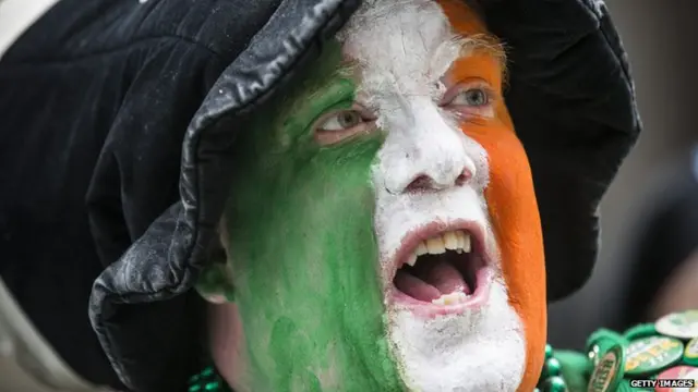 Man in Irish face paint