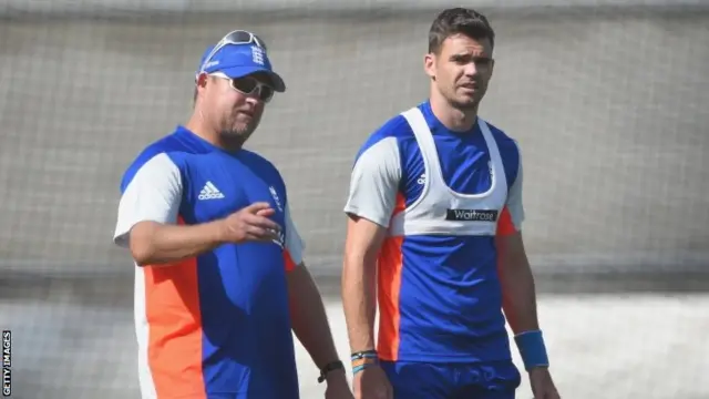 David Saker and England bowler Jimmy Anderson