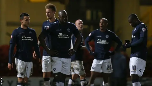 Millwall players look dejected