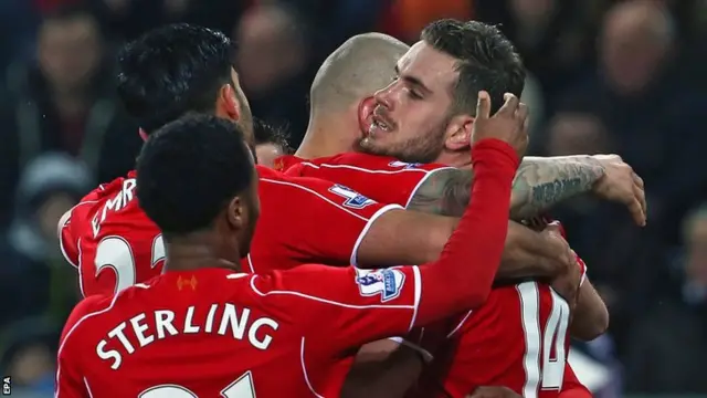 Jordan Henderson celebrates his goal for Liverpool