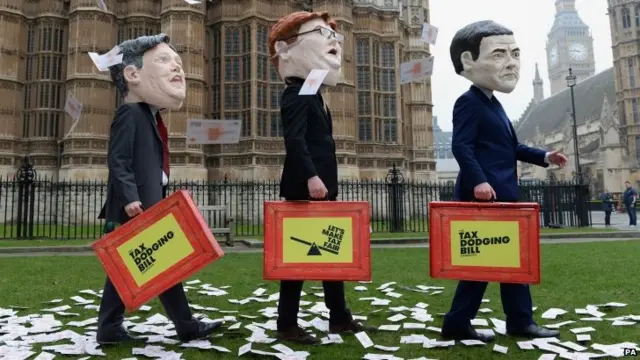 Protesters dressed as Ed Balls, Danny Alexander and George Osborne