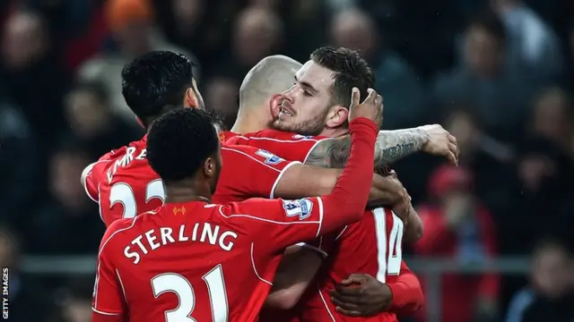 Liverpool celebrate Jordan Henderson's goal