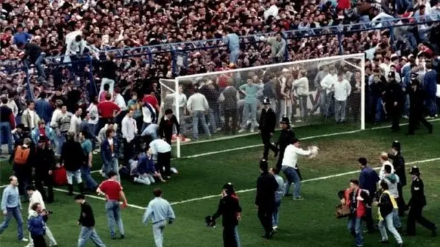 Fans and police at Leppings Lane end