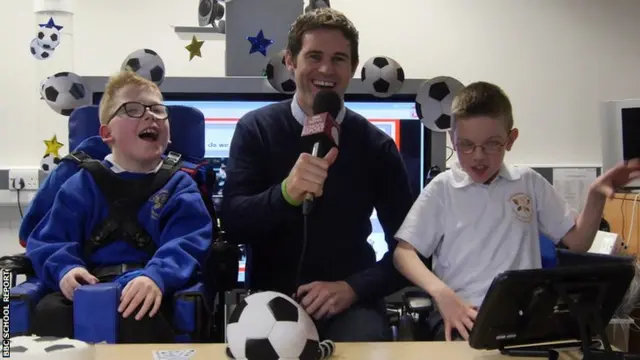 Kevin Kilbane with School Reporters Ben and Sam