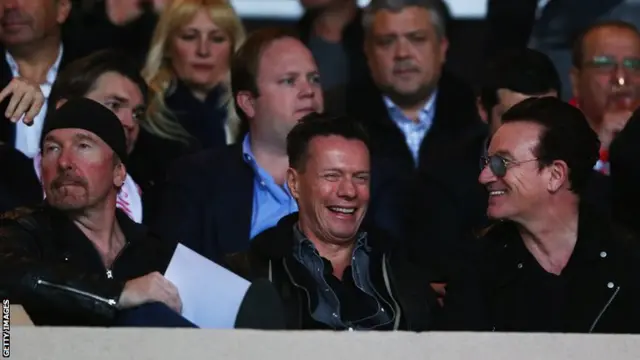 The Edge, Larry Mullins Jr and Bono at the Monaco v Arsenal match