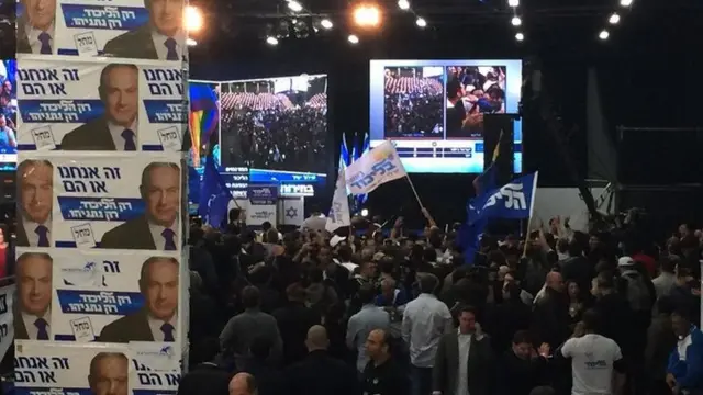 Likud supporters celebrate after release of exit polls in Israel