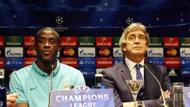 Yaya Toure and Manuel Pellegrini