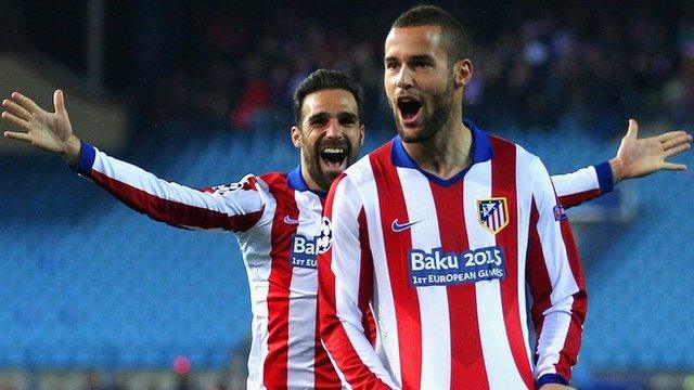 Atletico Madrid's Mario Suarez scores the opening goal