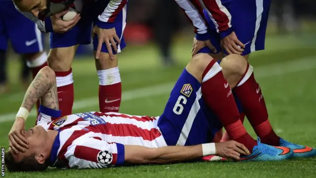 Mario Mandzukic lies injured