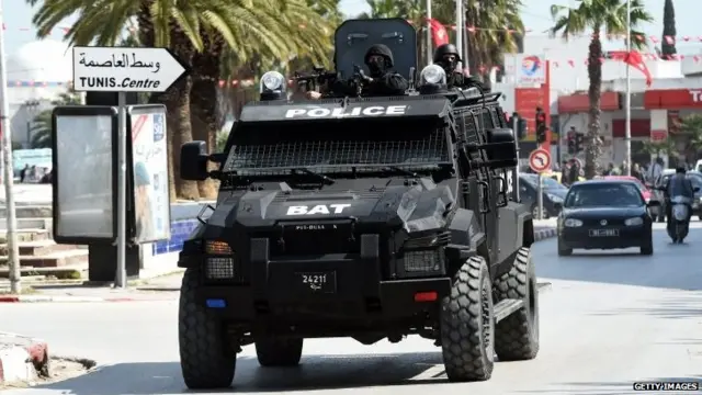 Tunisian security forces secure the area after gunmen attacked Tunis" famed Bardo Museum on March 18, 2015