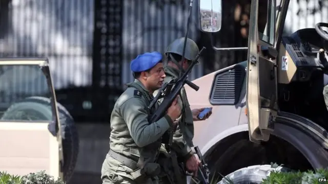 Members of the Tunisian armed forces take up positions after gunmen reportedly took hostages near the country"s parliament, outside the National Bardo Museum, Tunis, Tunisia, 18 March 2015