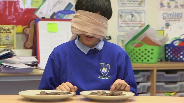 Child taking chocolate taste test