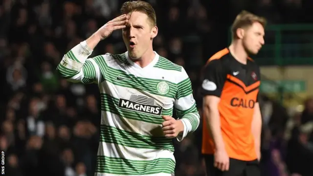 Kris Commons celebrates his goal to make it 3-0