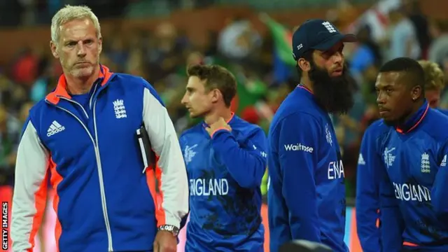 England coach Peter Moores (left) and some England players following defeat by Bangladesh