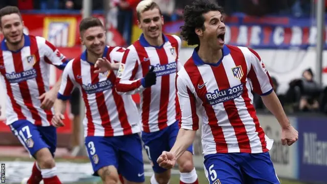 Tiago celebrates his opening goal for Atletico Madrid