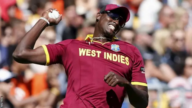 Jason Holder celebrates catching McCullum