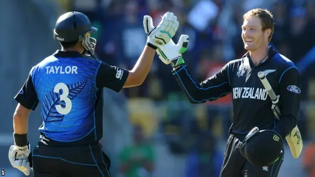 Taylor congratulates Guptill on his century