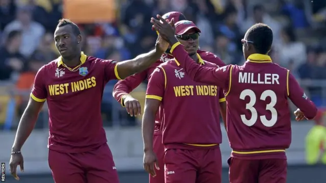 West Indies celebrate Anderson wicket