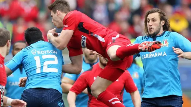 Liam Williams soars for a catch against Italy